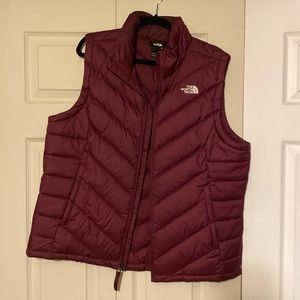 Maroon North Face vest size xl.